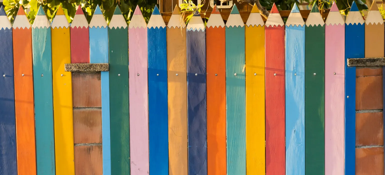 White blue and red wooden fence