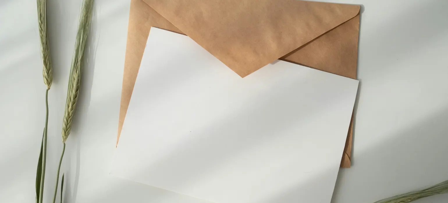 White paper and brown envelope
