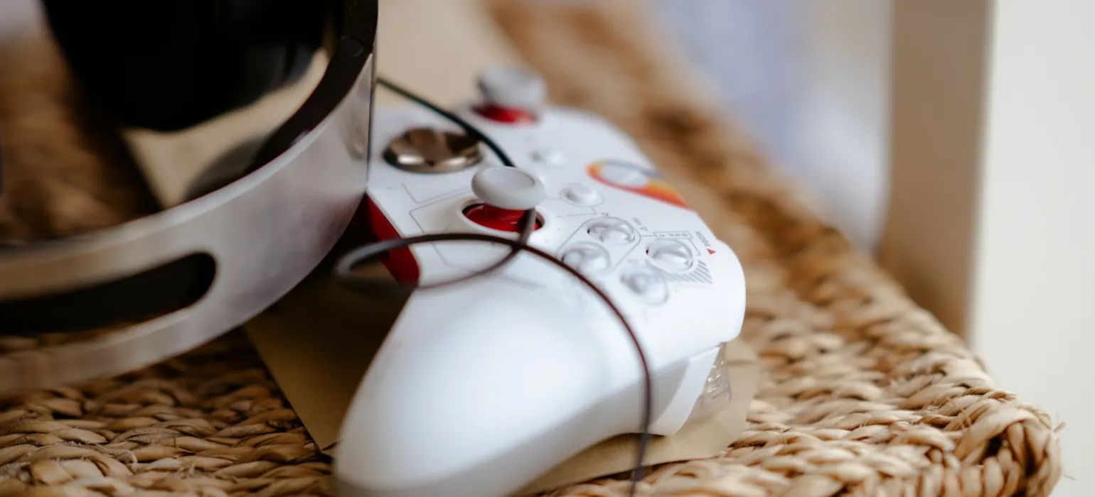 A close up of a nintendo wii game controller