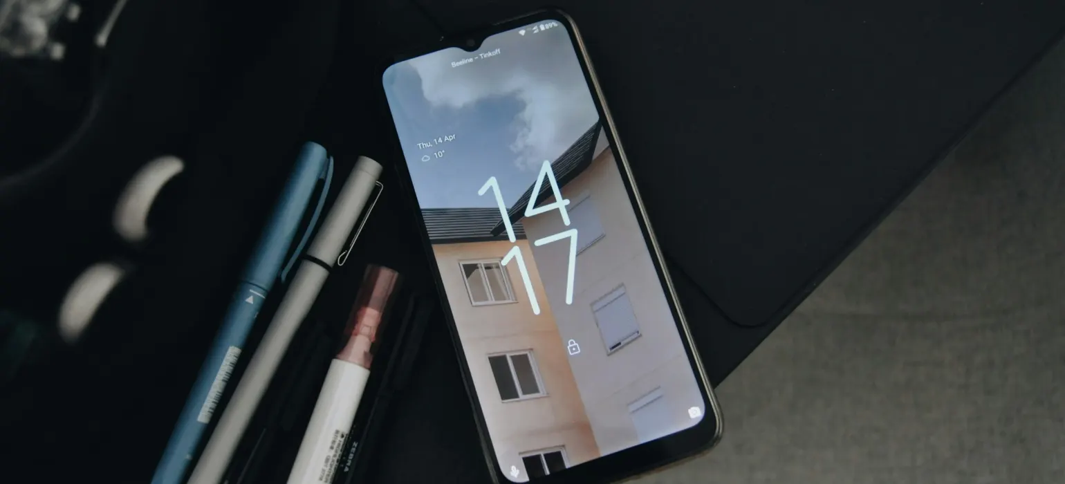 A cell phone sitting on top of a table