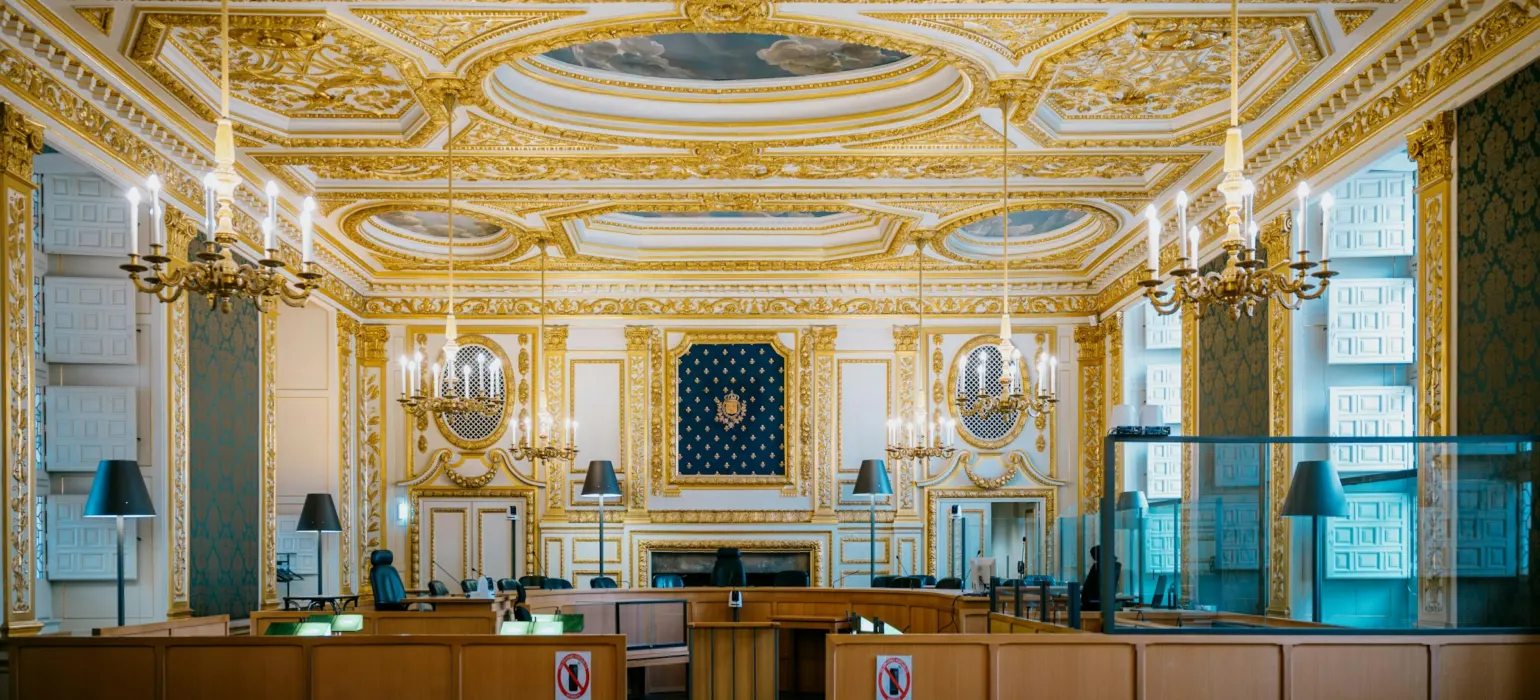 Empty courtroom with wooden benches