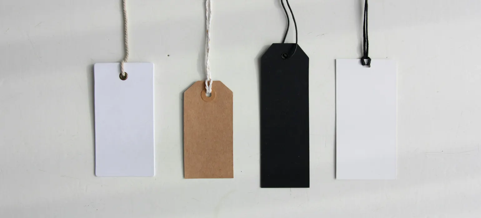 Four paper card tags