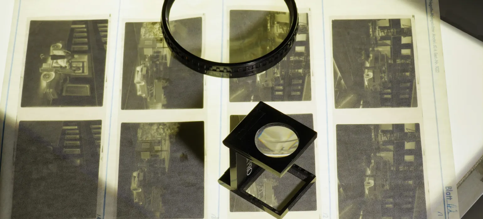 A magnifying glass sitting on top of a book