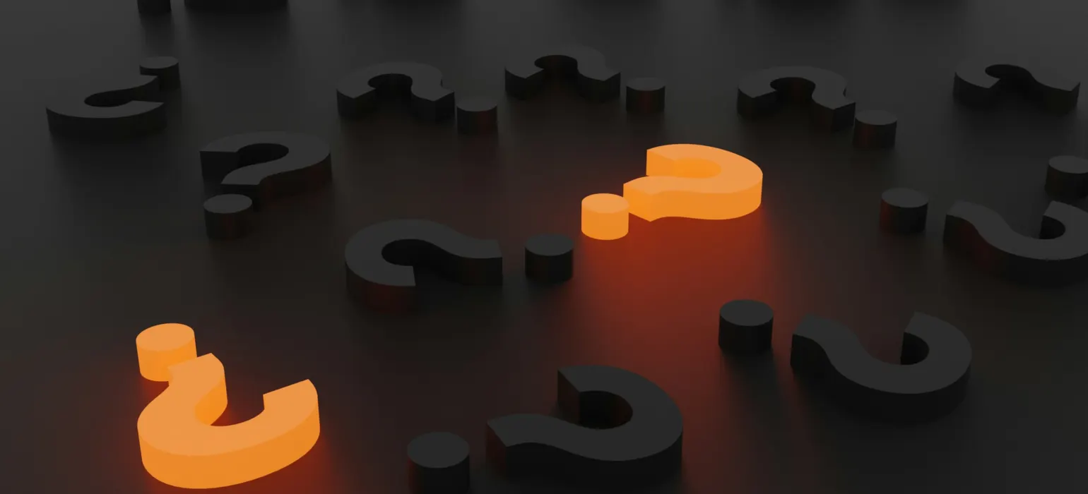 Scattered question mark shapes with two highlighted in orange